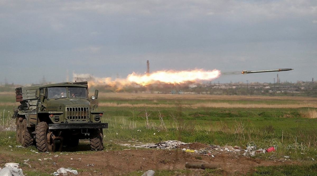 Service members of pro-Russian troops fire a BM-21 Grad multiple rocket launch system near a plant of Azovstal Iron and Steel Works in the southern port city of Mariupol. (REUTERS)