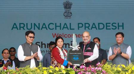 Union Home Minister Amit Shah during a rally in Arunachal Pradesh's Namsai. Arunachal Pradesh CM Pema Khandu and Union Minister Kiren Rijiju are also seen. (PTI Photo/Twitter@AmitShah)