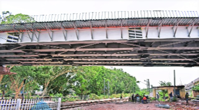 Girders being laid at the railway over-bridge. Express