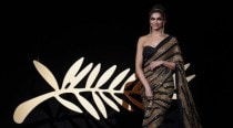 Why was Deepika dressed in sofa upholstery at Cannes?