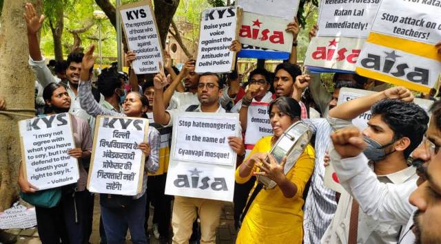 Teachers and students protest against the arrest of Hindu College Associate Professor Ratan Lal at DU's Arts Faculty. (Express Photo)