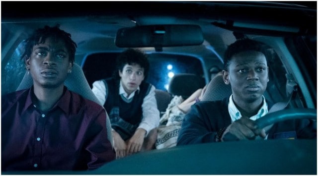 RJ Cyler, Donald Elise Watkins and Sebastian Chacon in a still from Emergency.