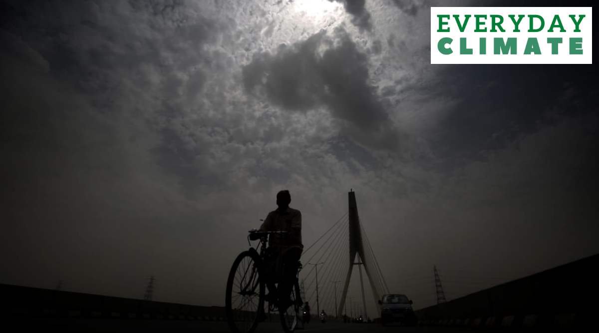 A cyclist in New Delhi on Monday, when some parts of the city recorded temperatures as high as 49.2 degrees Celsius. (Express Photo: Praveen Khanna)