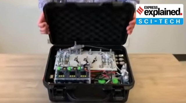 The suitcase-sized device uses electrical power to remove particles from water. MIT News/Video Grab