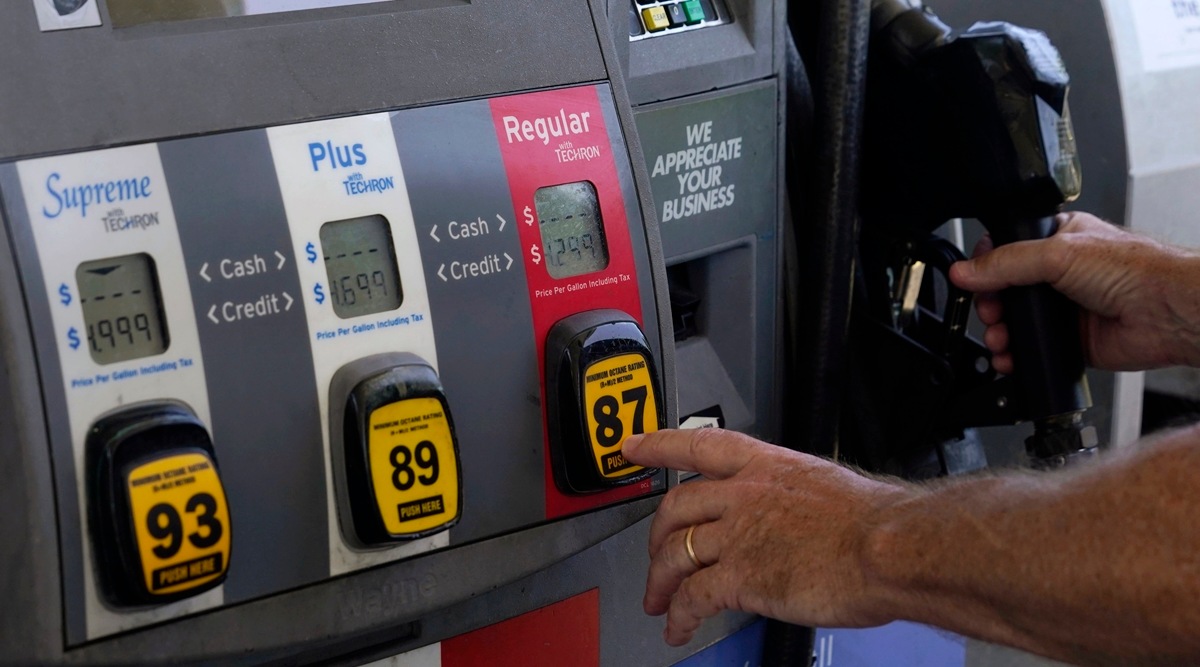 A customer pumps gas at an Exxon gas station on May 10, 2022, in Miami. (AP)