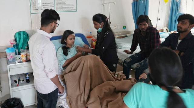 The injured students at Navin Hospital in Greater Noida on Sunday. (Express photo by Abhinav Saha)