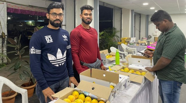 Swapnil Gadi attributes the good footfall at his stall to the superior quality of the fruit harvested at his orchards in the village of Pural in the Sindhudurg district.