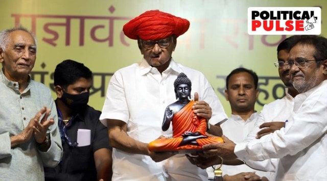 NCP chief Sharad Pawar with social activist Baba Adhav, during a book launch event at Bal Gandharva Ranga Mandir, on Friday. (Express photo by Pavan Khengre)