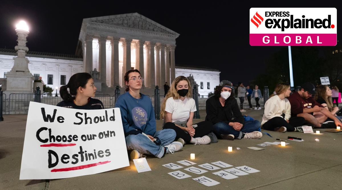A crowd of people gather outside the Supreme Court early Tuesday, May 3, 2022, in Washington. (AP Photo/Alex Brandon)