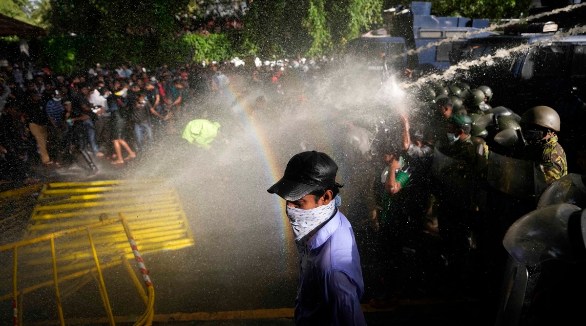 Police fire tear gas and water cannons to disperse protesting members of the Inter University Students Federation during an anti government protest in Colombo, Sri Lanka, May 19, 2022. (AP)