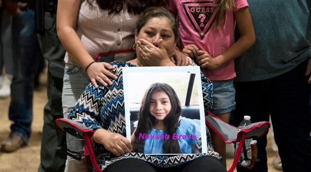 Esmeralda Bravo, 63, sheds tears while holding a photo of her granddaughter, Nevaeh, one of the Robb Elementary School shooting victims, during a prayer vigil in Uvalde, Texas. (AP)