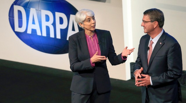 File photo of Arati Prabhakar, left, the director of Defense Advanced Research Projects Agency speaks after introducing then-Defense Secretary Ash Carter to speak Sept. 9, 2015, at the opening of the DARPA conference at the America's Center in St. Louis. (AP)