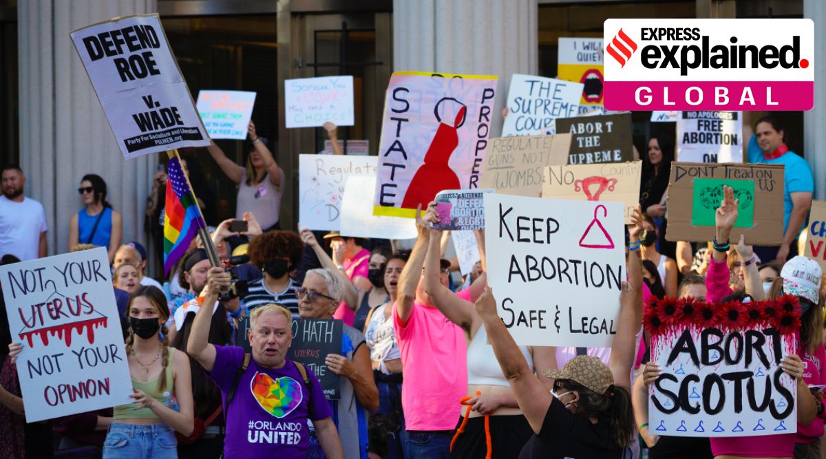 Demonstrators hold a rally in front of the Hall of Justice on Friday, June 24, 2022 in downtown San Diego. (Nelvin C. Cepeda /The San Diego Union-Tribune via AP)