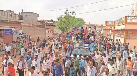 The Dalit procession passes through Chuval-Dangarava village in Ahmedabad on Sunday. (Express Photo)