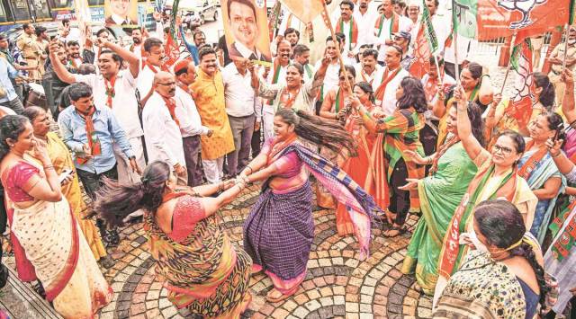 BJP workers celebrate the party’s victory in Legislative Council polls, at Vashi in Navi Mumbai on Tuesday. (PTI)