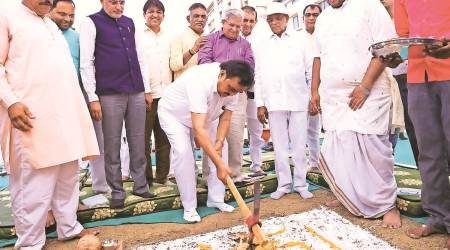 Gujarat BJP president CR Paatil lays foundation stone of a new unit of the Sumul Dairy in Surat Wednesday. Hanif Malek. (Express Photo)