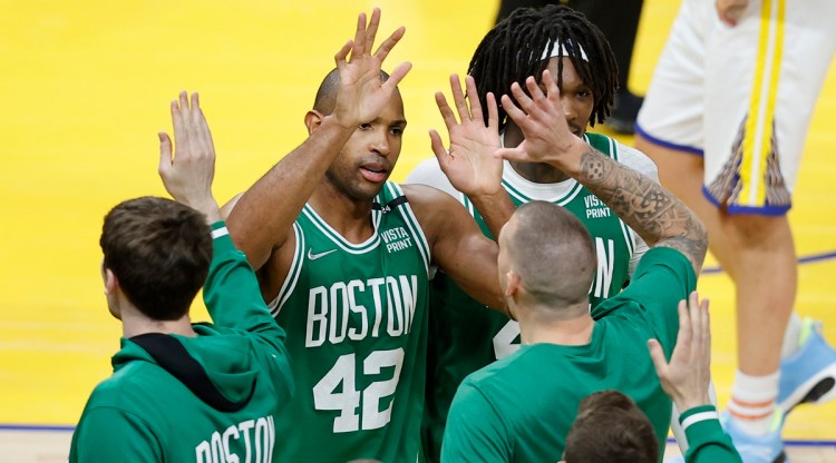 Boston Celtics center Al Horford celebrates with teammates during the second half of Game 1 of basketball's NBA Finals against the Golden State Warriors in San Francisco on Thursday. (Photo: AP)