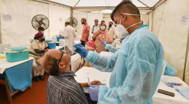 A health worker collects a swab sample for Covid-19 test. (File)