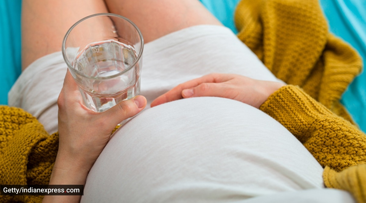 Premium Photo  Pregnant woman with sign no drink on her belly