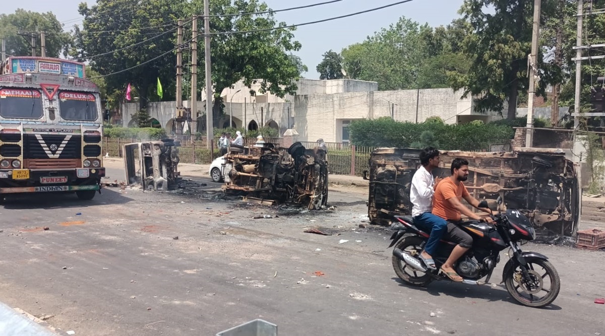 Protests turned violent in Haryana's Palwal as hundreds of youths blocked roads and resorted to stone-pelting, as well as torched a few vehicles. (Express photo)