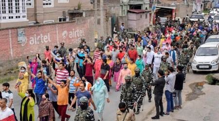 People from the Kashmiri Pandit community shout slogans during their protest march against the killing of the school teacher Rajni Bala, near Srinagar Airport in June. (PTI, file)