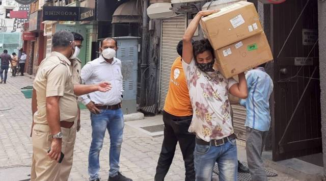 Oxygen concentrators being taken away following the raid at Khan Chacha restaurant in Khan Market, New Delhi. (PTI/File)