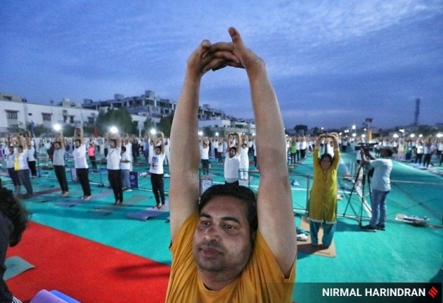 Governor Acharya Devvrat and CM Bhupendra Patel also joined Baba Ramdev, Governor Acharya Devvrat, CM Bhupendra Patel, Governor, CM and Baba Ramdev, Yoga rehearsals, Yoga rehearsals in Ahmedabad, Yoga by Governor, CM and Baba Ramdev, Baba Ramdev, Yoga, yoga images of CM and Baba Ramdev, Baba Ramdev