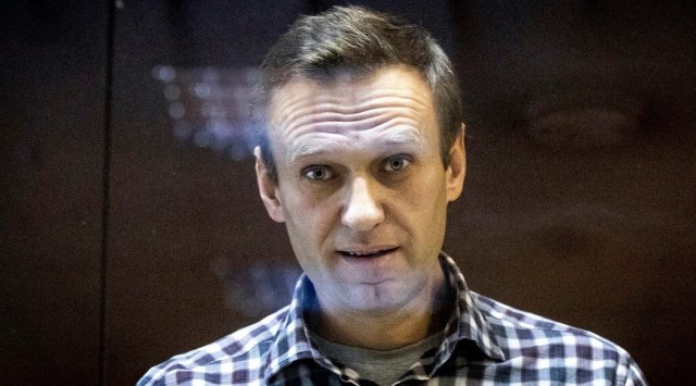 Russian opposition leader Alexei Navalny looks at photographers standing in the Babuskinsky District Court in Moscow, Russia. (AP, file)