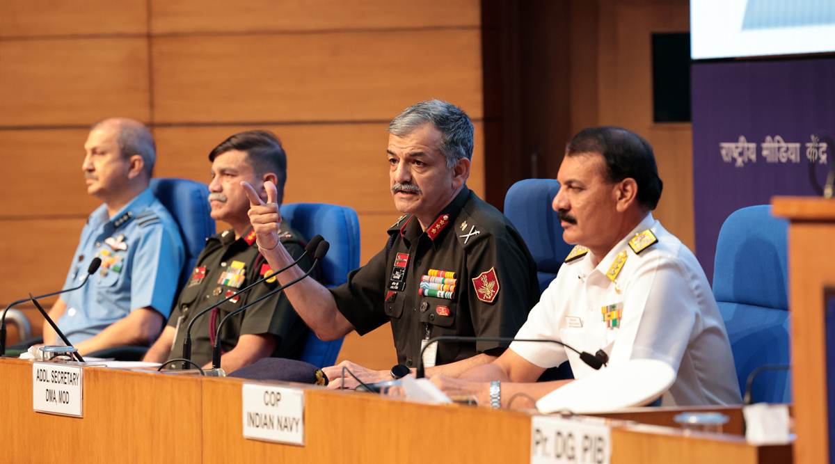 Officers from the tri-services at a press conference in New Delhi on Tuesday. (Express photo by Renuka Puri)