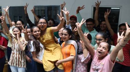 PSEB Class 12th Result 2022: Jubilant students celebrate +2 result at Teja Singh Swatantra Memorial School at Ludhiana. Express photo by Gurmeet Singh
