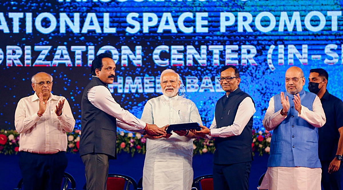 Prime Minister Narendra Modi receives a memento from IN-SPACe Chairman Pawan Kumar Goenka(R) during the inauguration of the headquarters of Indian National Space Promotion and Authorisation Centre (IN-SPACe), in Ahmedabad, Friday, June 10, 2022. Union Home Minister Amit Shah and Gujarat CM Bhupendra Patel are also seen. (PTI Photo)