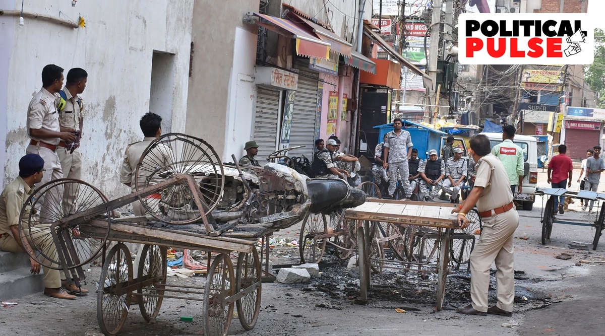 Police investigate at the site of violence, a day after clashes during protest against now-suspended BJP leaders remark on Prophet Muhammad, in Ranchi. (PTI)