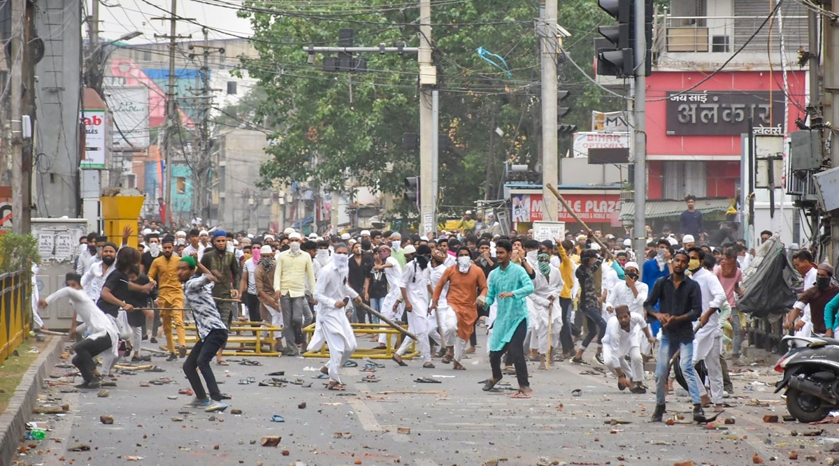 Miscreants throw stones on police during a protest over controversial remarks made by two now-suspended BJP leaders about Prophet Mohammad, in Ranchi. (PTI)