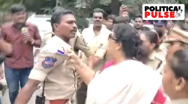 In a video, the former Union minister can be seen arguing with the police personnel who had gathered to break up the Congress protest and holding on to the policeman’s collar while being taken to the police vehicle. (ANI/screengrab)

