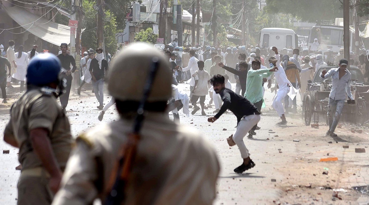 Miscreants throw stones on police during a protest over controversial remarks made by two now-suspended BJP leaders about Prophet Mohammad, in Prayagraj. (PTI)