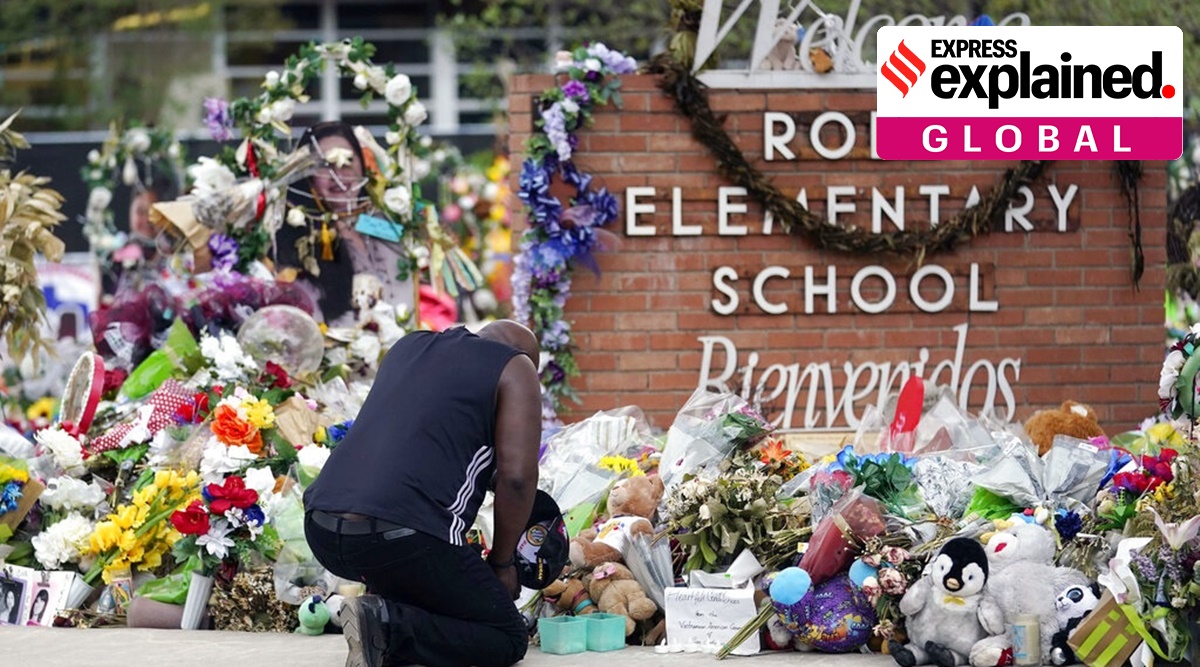 Reggie Daniels pays his respects a memorial at Robb Elementary School, Thursday, June 9, 2022, in Uvalde, Texas, created to honor the victims killed in the recent school shooting. Two teachers and 19 students were killed in the mass shooting. (AP Photo)