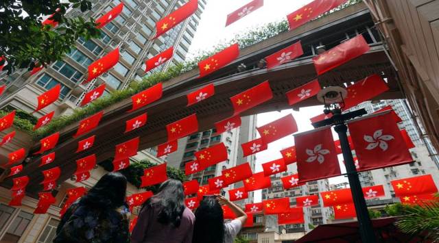 Streets of Hong Kong decorated with Chinese and Hong Kong flags (Reuters pic)