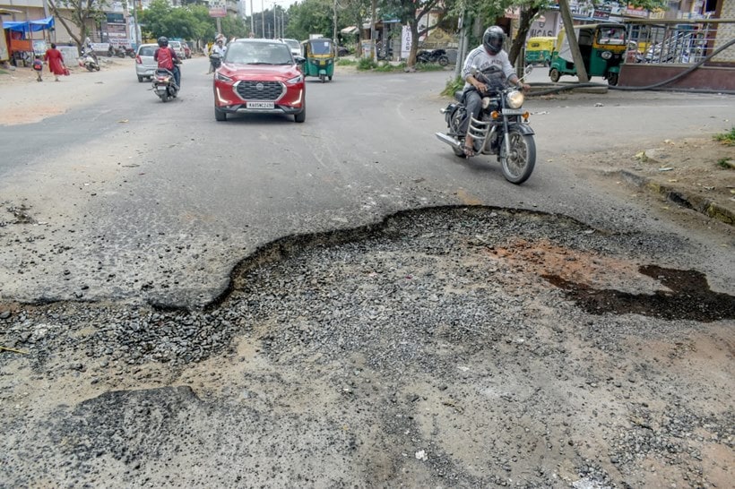 In Photos: Bengaluru’s Pothole Ridden Roads Remain A Hazard | India ...