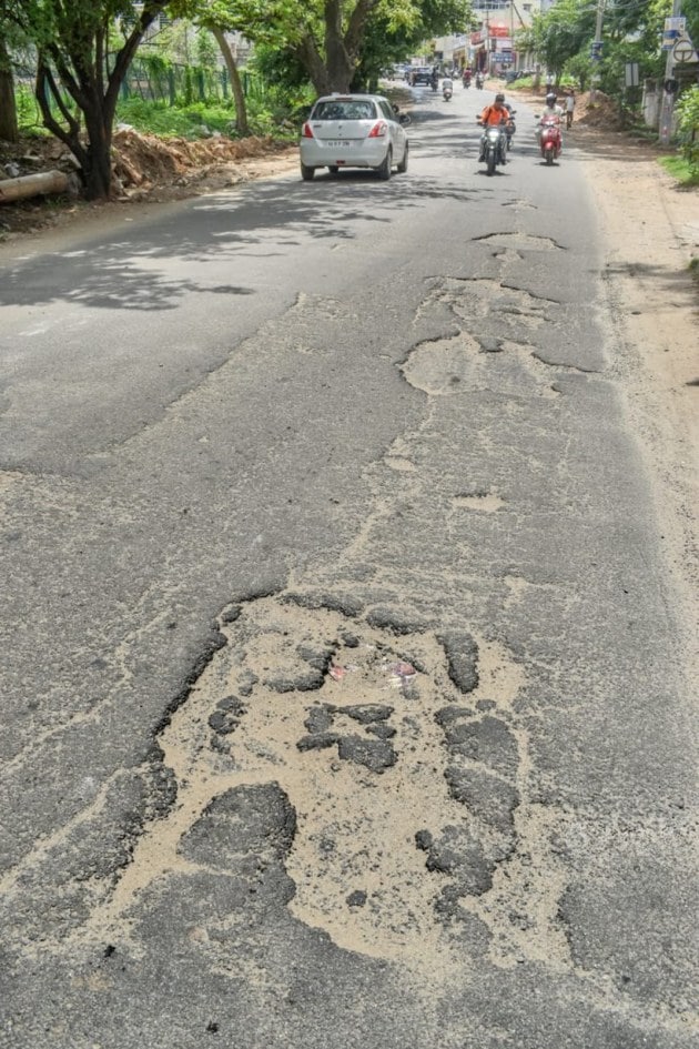 In photos: Bengaluru’s pothole ridden roads remain a hazard | India ...