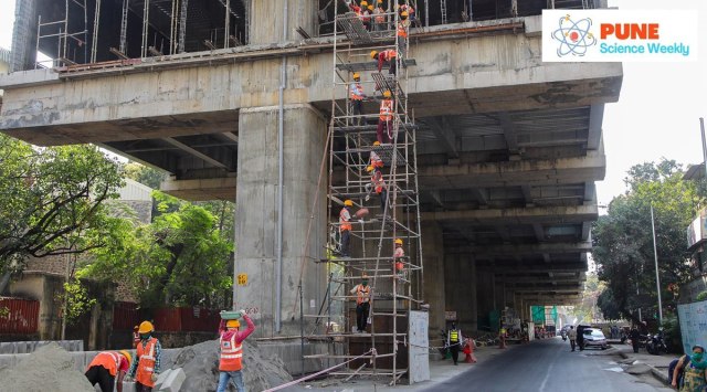 Workers at a metro construction site on Karve Road in Pune. (Express Photo by Ashish Kale)