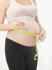 closeup-photo-young-pregnant-woman-holding-glass-water-measuring-belly-concept-sport-healthcare-during-pregnancy_454047-5371