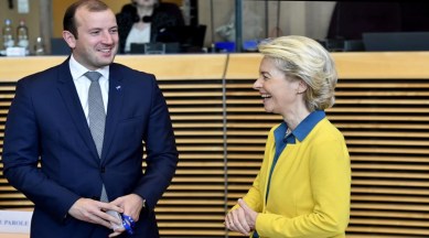 European Commission President Ursula von der Leyen, right, speaks with European Commissioner for Environment and Oceans Virginijus Sinkevicius during a meeting of the College of Commissioners at EU headquarters in Brussels, Friday, June 17, 2022. Ukraine's request to join the European Union may advance Friday with a recommendation from the EU's executive arm that the war-torn country deserves to become a candidate for membership in the 27-nation bloc. (AP)