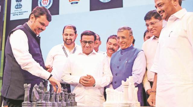 BJP leader Devendra Fadnavis and Minister for Sports Sunil Kedar at the Maharashtra International Open Grandmasters Chess Tournament, in Pune on Tuesday. (Express photo by Ashish Kale)