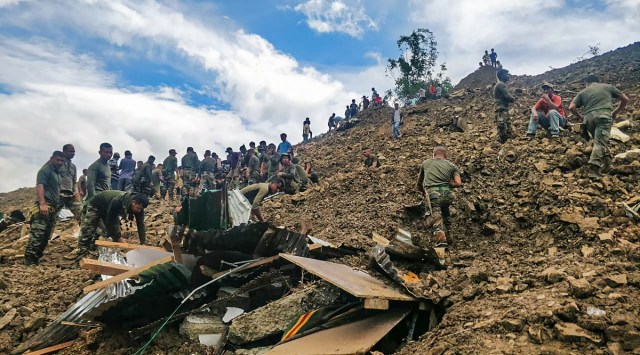 Rescue operations underway after a massive landslide hit the Tupul railway construction camp in Noney distric of Manipurt, Thursday, June 30, 2022. (PTI Photo)  