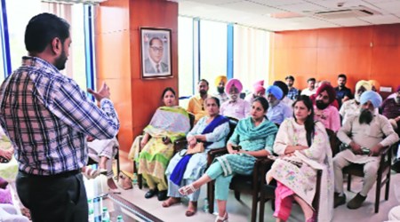 Mohali mayor Amarjit Sidhu during a meeting with Congress councillors on Tuesday. (Express Photo)