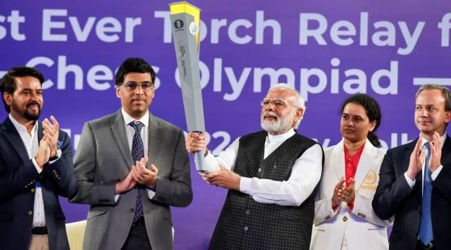 PM Modi also made a ceremonial move on the chess board against woman Grandmaster Kneru Humpy. (PTI)