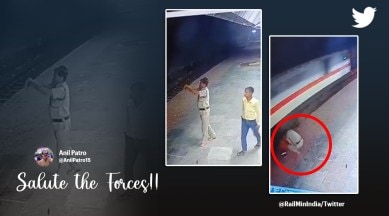 RPF officer saves woman, Railway Police force rescues woman from train crash, Railway rescue, Video RPF officer saves woman Lalitpur station, indian express