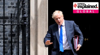 British Prime Minister Boris Johnson leaves 10 Downing Street in London on July 6. Johnson is defiant, battling with his back to the wall to stay in power. (AP/PTI)