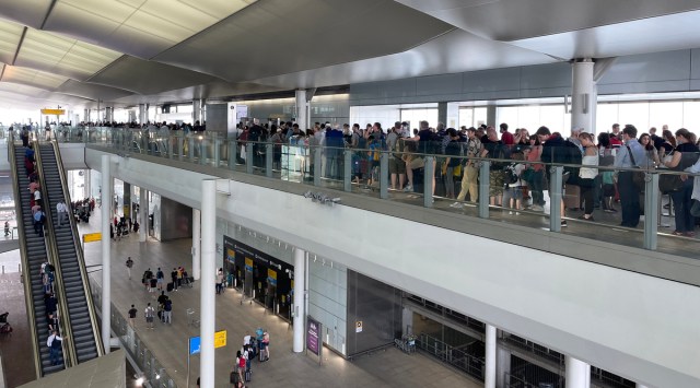Long lines of travelers at London’s Heathrow Airport on Thursday, July 14, 2022. After two years of pandemic-enforced staycations, demand for travel has come roaring back in Europe, and airports are finding it impossible to keep up. (Isabella Kwai/The New York Times)