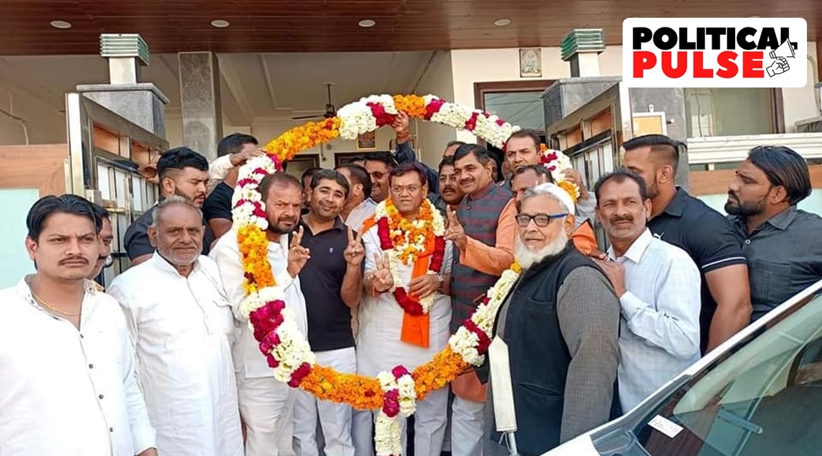 Dinesh Khatik (middle) is one of the BJP's prominent Dalit leaders in western UP. (Image: Facebook)